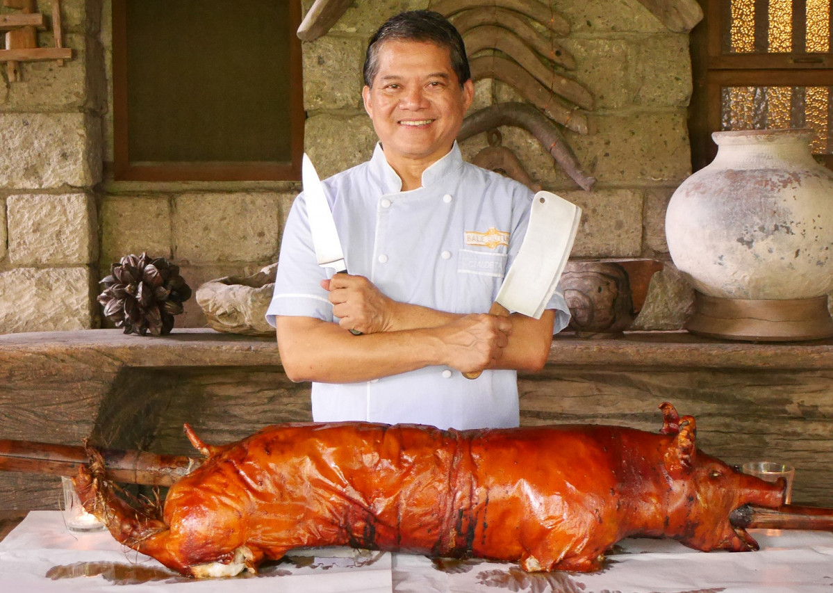 LECHON WITH KNIVES