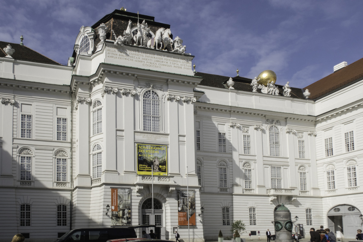 The entrance to the hofburg imperial palace vienna austria from josefsplatz one of the biggest palace complexes in the world its oldest parts date to the 13th century with construc